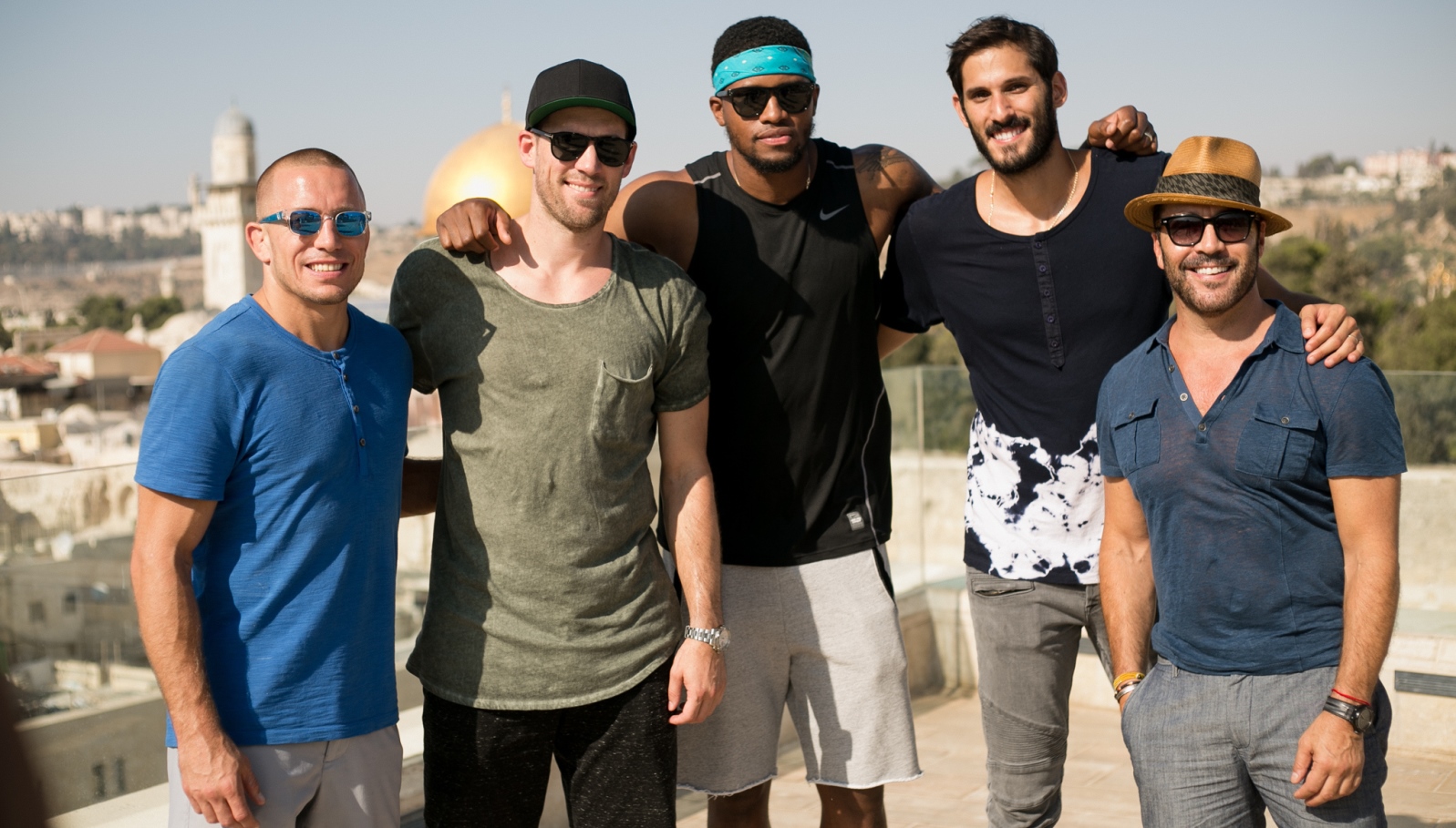 From right, Jeremy Piven, NBA players Omri Casspi, Rudy Gay, Beno Udrih, UFC fighter Georges St-Pierre. Photo by Shir Hassin