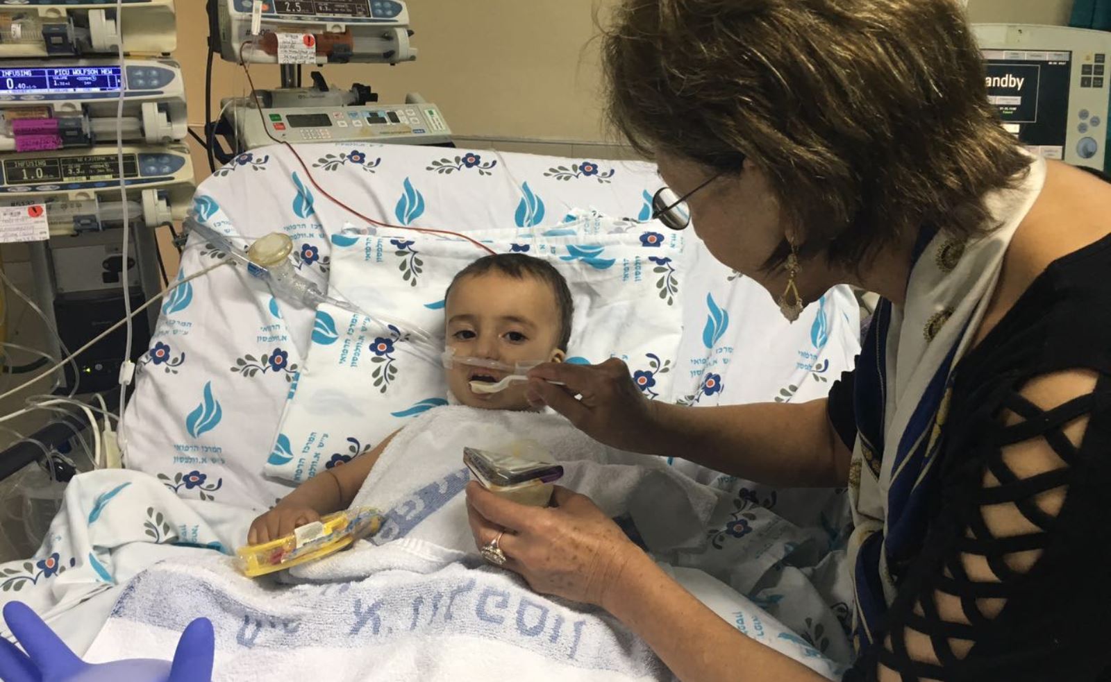 California Rotary Club member Fary Moini, formerly a cardiology nurse from Iran, volunteered to care of Yehia. Photo courtesy of SACH California Rotary Club member Fary Moini, formerly a cardiology nurse from Iran, volunteered to care of Yehia. Photo courtesy of SACH