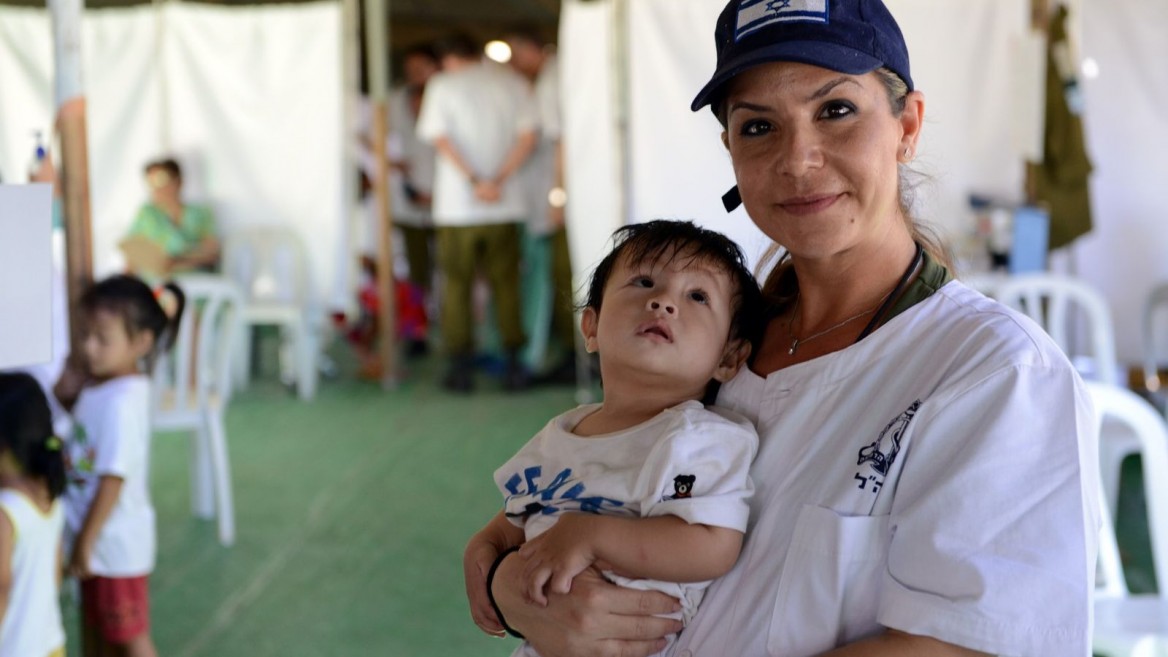 An IDF rescue worker in a field hospital following the 2013 typhoon in the Philippines. Photo courtesy IDF