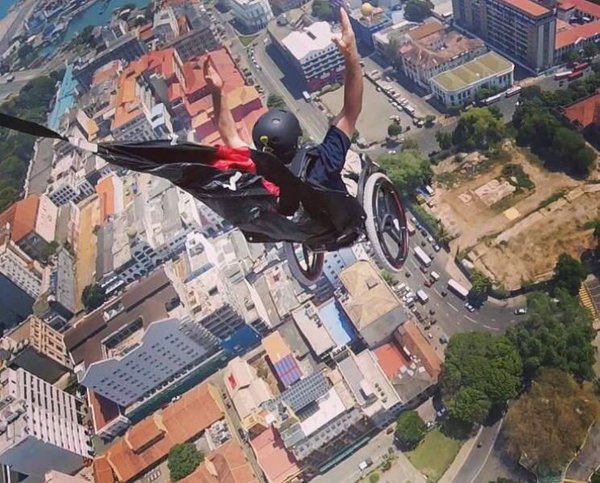 Lonnie Bissonnette doing his stunts in a wheelchair fitted with SoftWheels. Photos via facebook.com/TheLonnieBissonnette