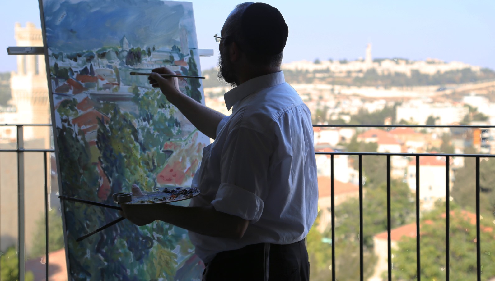 Motta Brim painting on the patio. Photo by Sofya Balashev Motta Brim painting on the patio. Photo by Sofya Balashev