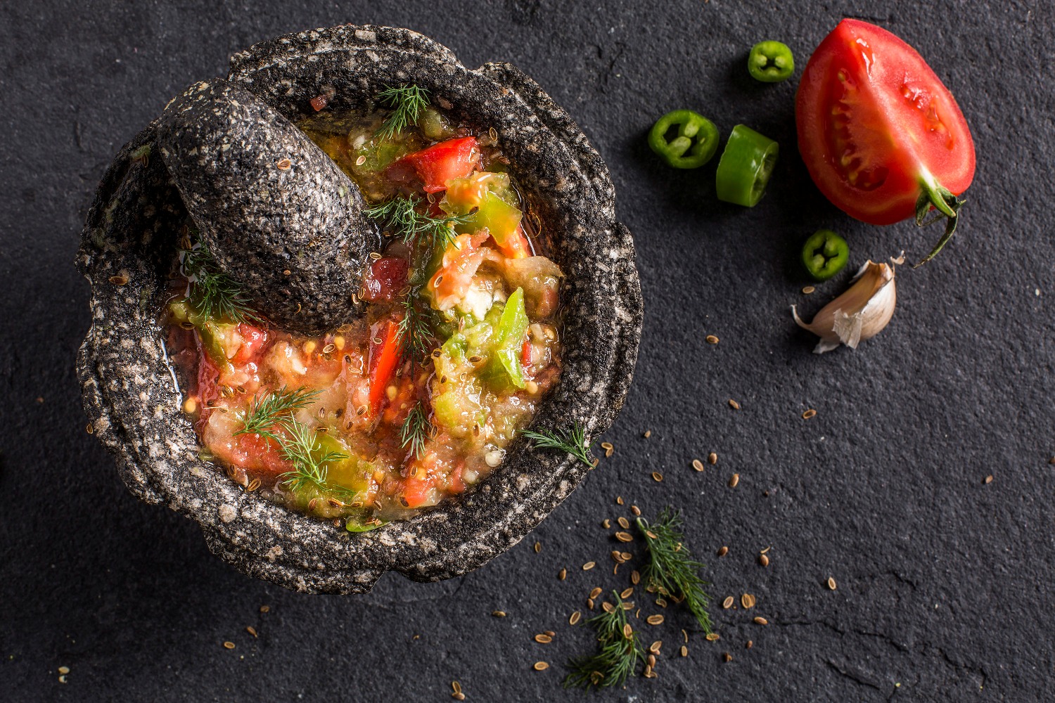 Daka Gazawia – onions, garlic, chili peppers, dill seeds, and tomatoes are ground one after the other in this salad. Photo by Asaf Ambram