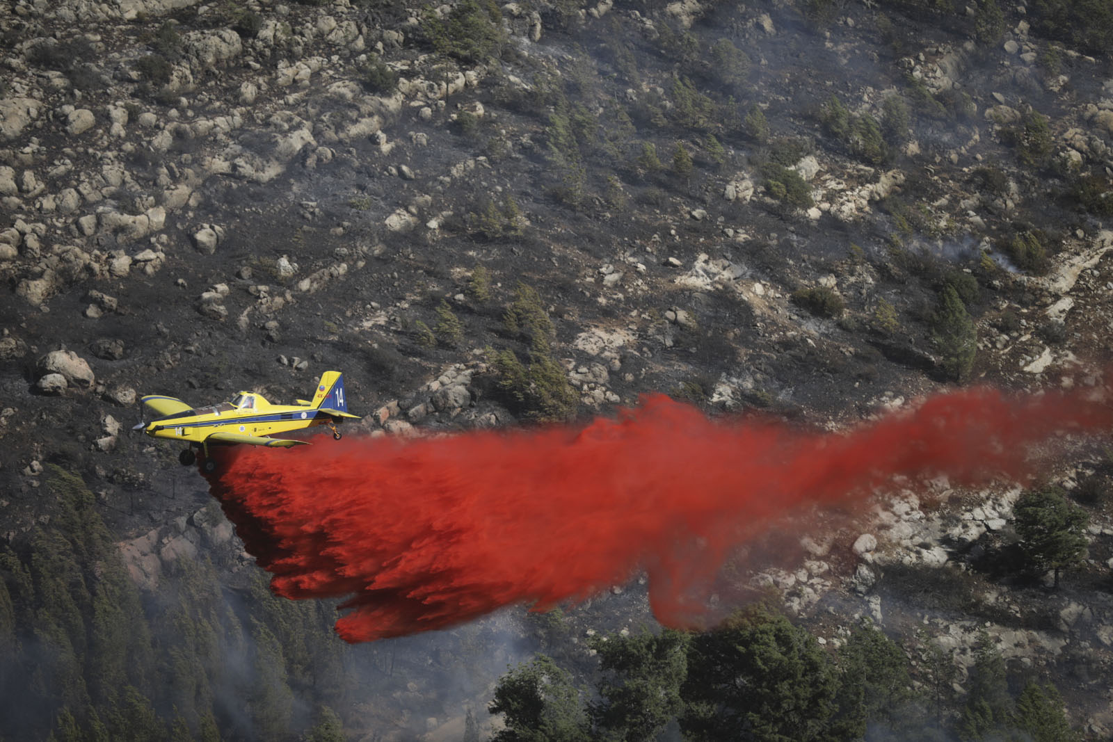 Israeli firefighter aircraft try to extinguish a forest fire near Neve Ilan, outside of Jerusalem on November 24, 2016. Photo by Yonatan Sindel/Flash90 