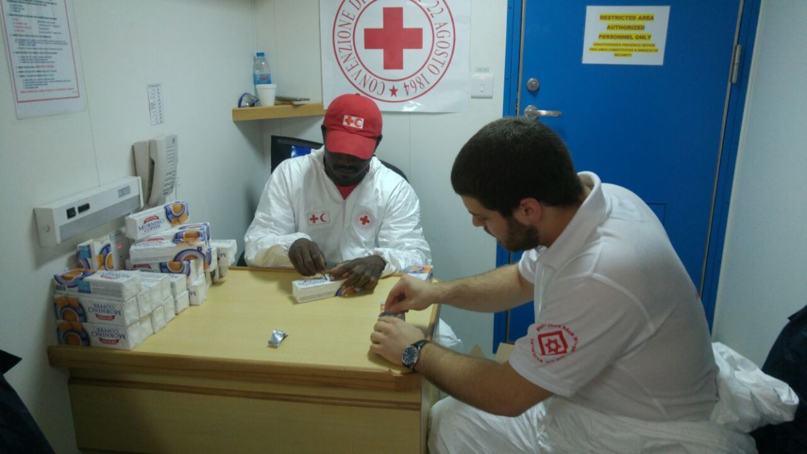 Izzy Papa, right, working with a Red Cross/Red Crescent volunteer. Photo courtesy of MDA Izzy Papa, right, working with a Red Cross/Red Crescent volunteer. Photo courtesy of MDA