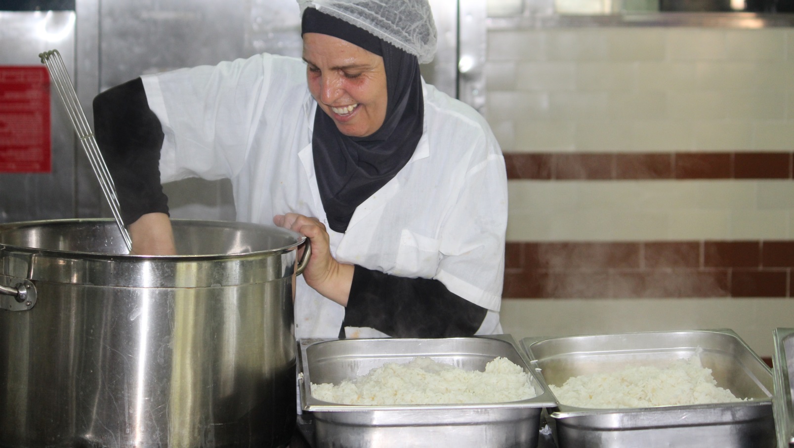 Cooking Coexistence has a triple bottom line. Photo courtesy of Dualis Social Investment Fund