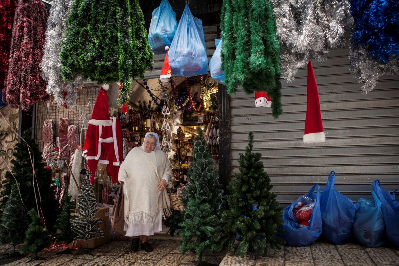 A nun shops for Christmas decorations in a store in the Old City of Jerusalem. Photo by Itay Cohen/Flash90.Jerusalem. Photo by Miriam Alster/Flash90.