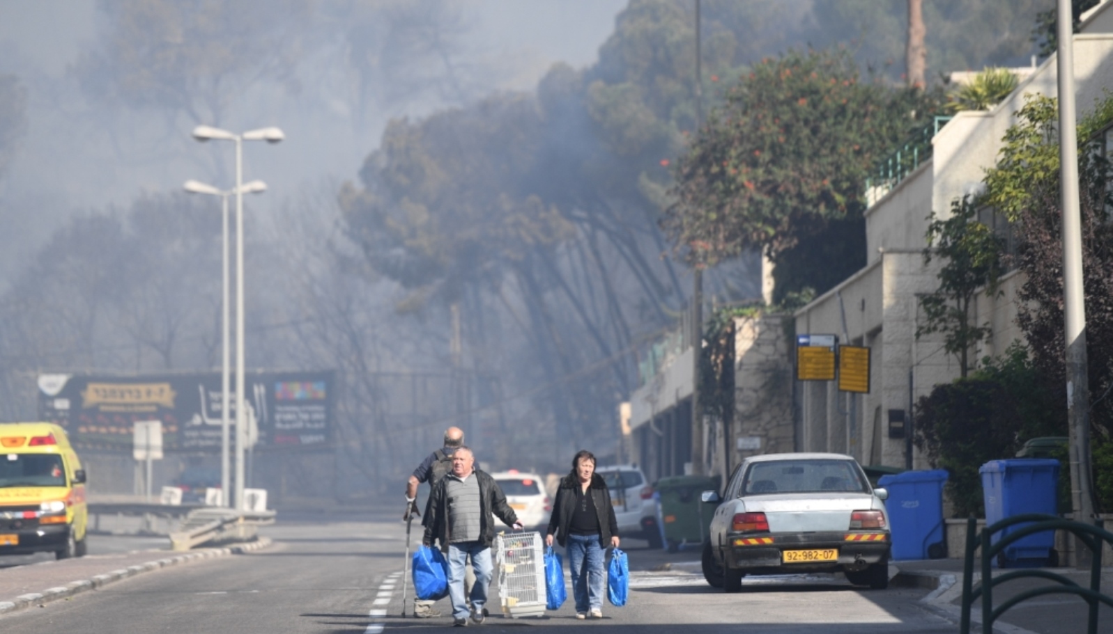 Haifa citizens fleeing the fires, November 2016. Photo courtesy of Haifa municipality