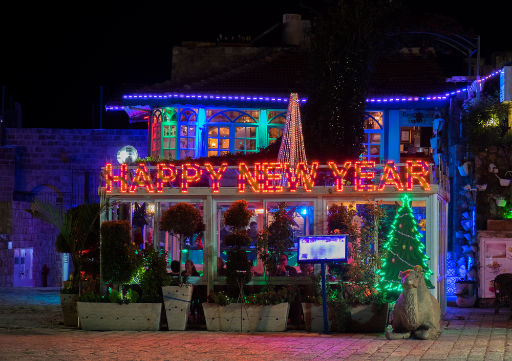 A Happy new year sign on a cafe in Jaffa. Photo by Shutterstock.com