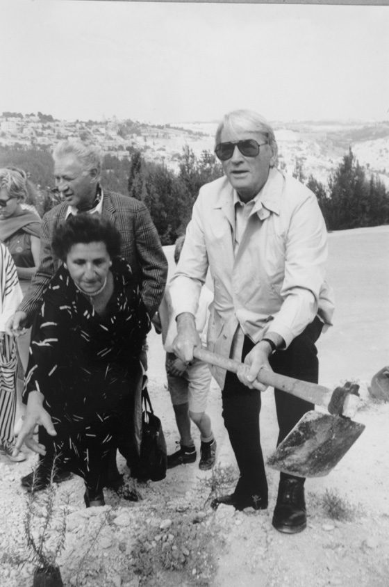 Gregory Peck plants a tree in Hashalom (Peace) Forest in Israel in 1988. Photo courtesy of KKL-JNF Archive