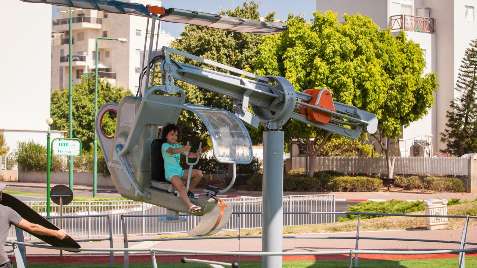 The Cockpit simulates a helicopter’s flight. The child or adult elevates the apparatus via a handheld pump, then pedals to initiate propeller motion and control speed. The energy generated by the manual work is converted to light up the structure. Photo courtesy of ABA Science Play The Cockpit simulates a helicopter’s flight. The child or adult elevates the apparatus via a handheld pump, then pedals to initiate propeller motion and control speed. The energy generated by the manual work is converted to light up the structure. Photo courtesy of ABA Science Play