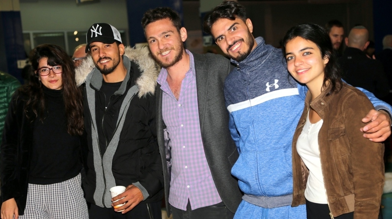 Zaki Djemal, center, with guests at the Jerusalem Double championship at Davidov’s Garage. Photo by Shabtai Amedi