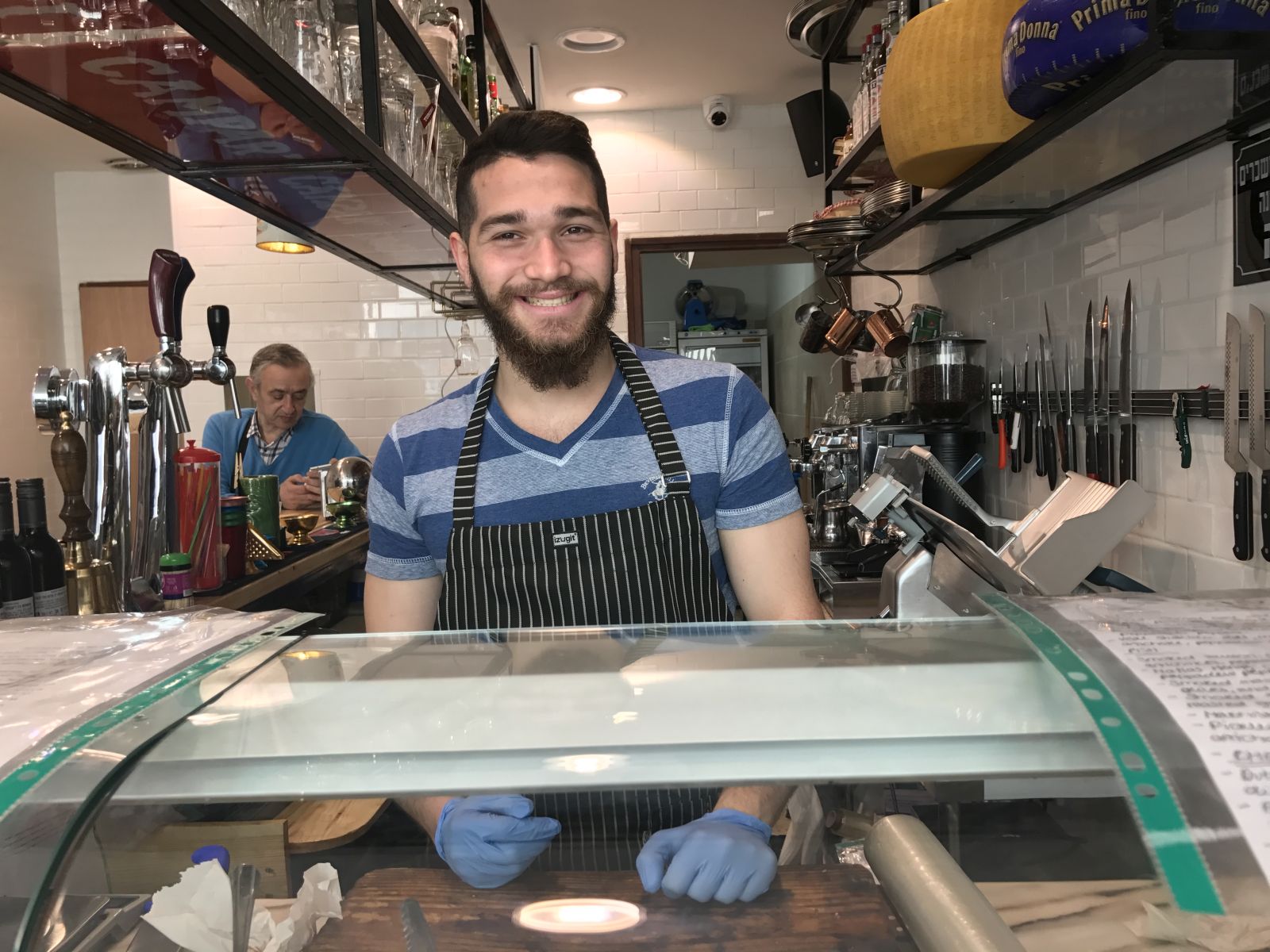 Everyone’s a hipster. An assistant at the Yom Tov sandwich bar. Photo by Nicky Blackburn