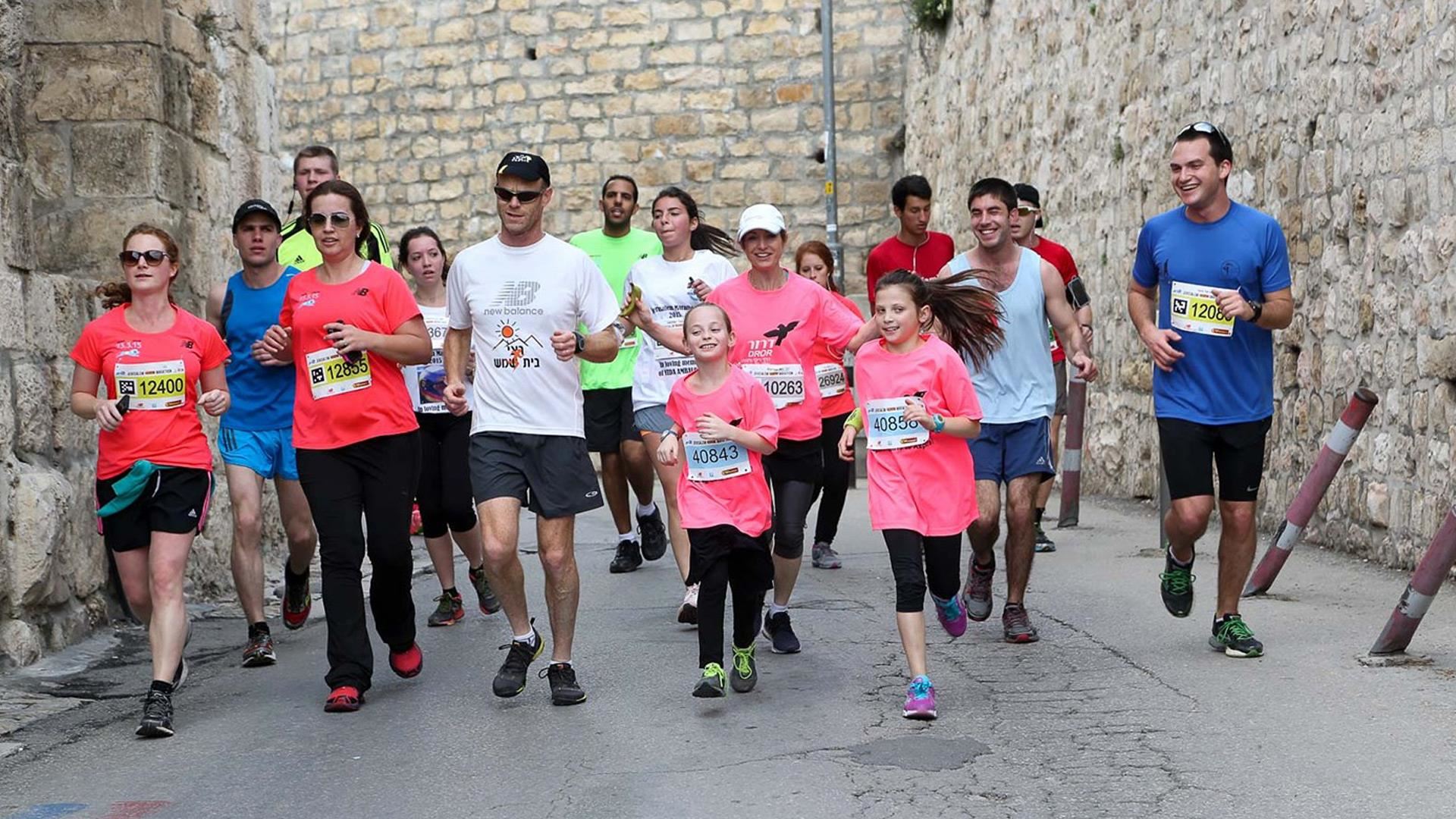 Runners take to the streets of Jerusalem for the city's annual marathon. Photo Jerusalem Winner Marathon