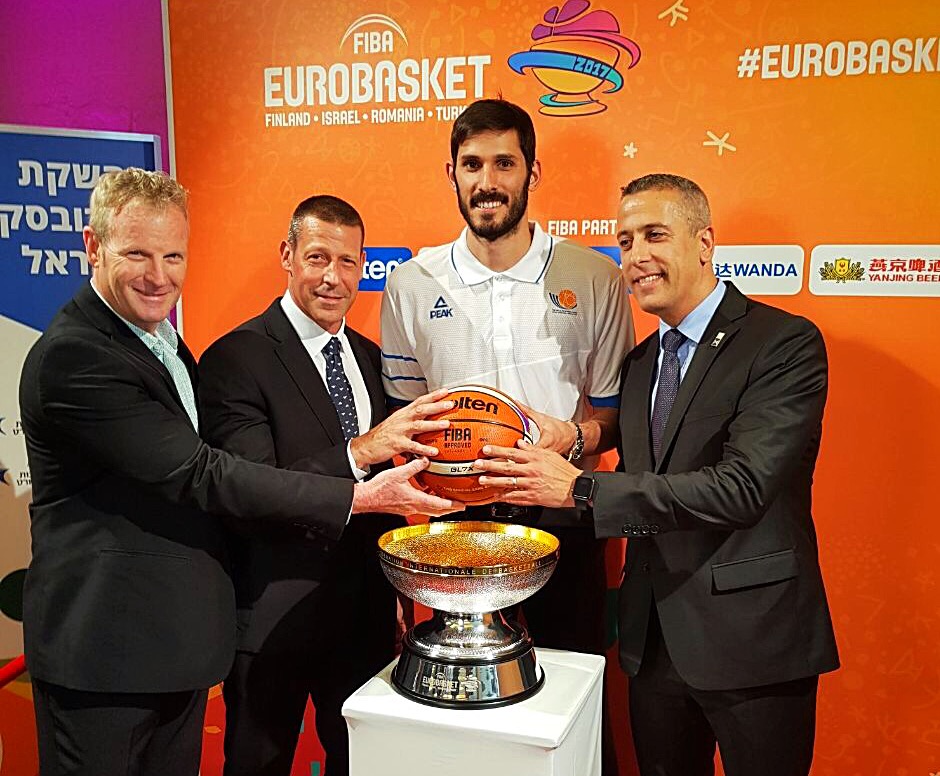 Israel National Team captain and Minnesota Timberwolves NBA player Omri Caspi, center, at the announcement of the EuroBasket championships in Israel this August, with Tel Aviv Hilton managers Yossi Biton (right), Lior Kahana (second left) and Motti Verses, Hilton Israel Head of public Relations (far left). Photo: courtesy