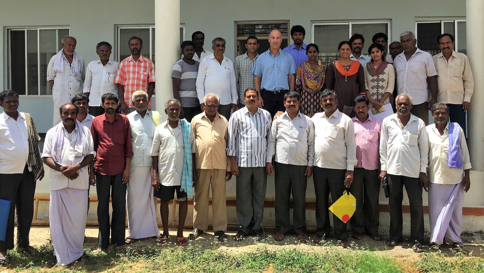 Biofeed CEO Nimrod Israely, top center, with Indian mango growers in Karnataka. Photo: courtesy