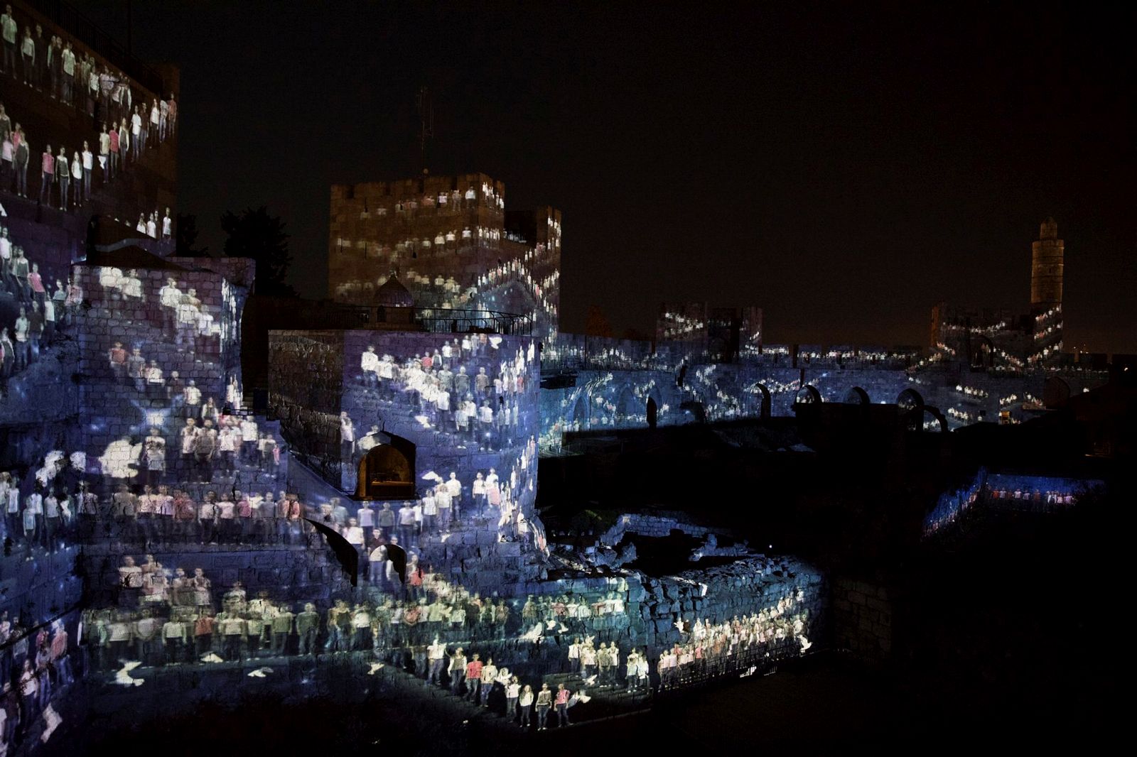 The people of Jerusalem projected onto the walls of the Citadel. Photo by Yonatan Sindel/Flash90