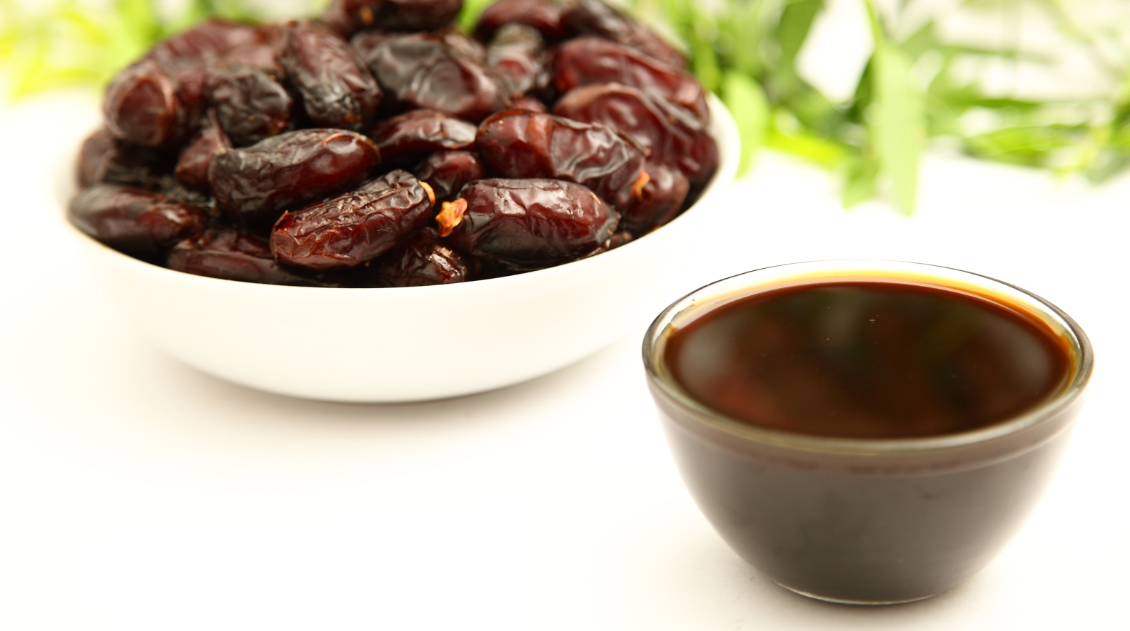 Dates and date honey image via Shutterstock.com