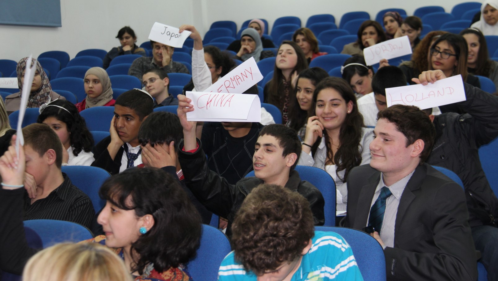Kids from Petah Tikva and Kafr Kassem at a debate in 2012. Photo: courtesy