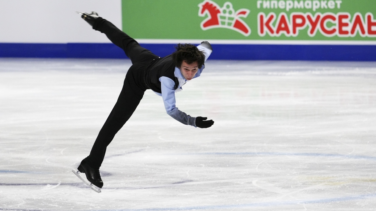 Alexei Bychenko performs at ISU European Figure Skating Championship in Stockholm, 2015. Photo by Olga Besnard/Shutterstock.com