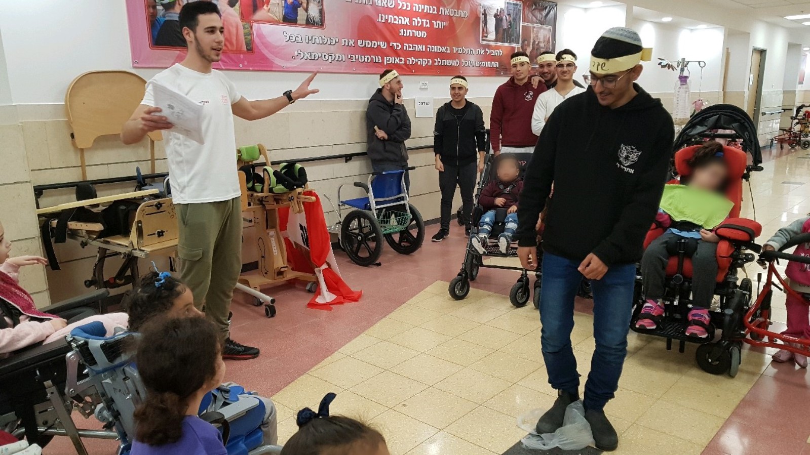 Freshmen from AMIT Beersheva interacting with children at ALEH Negev. Photo courtesy of ALEH