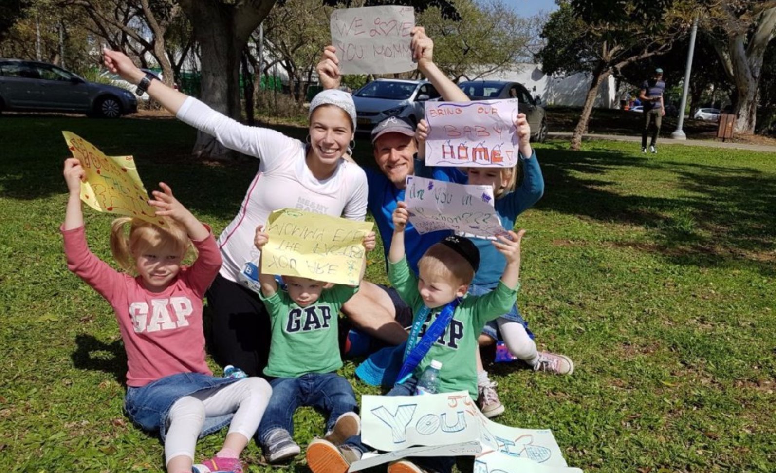 Beatie and Michael Deutsch with their (then) four kids at the 2017 Tel Aviv Marathon. Photo via Instagram