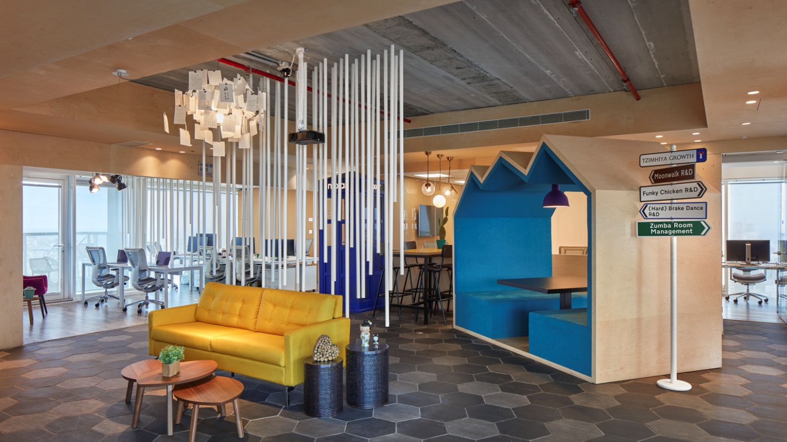A telephone booth and funky sitting areas are among design highlights at Nexar. Photo by Shai Gil