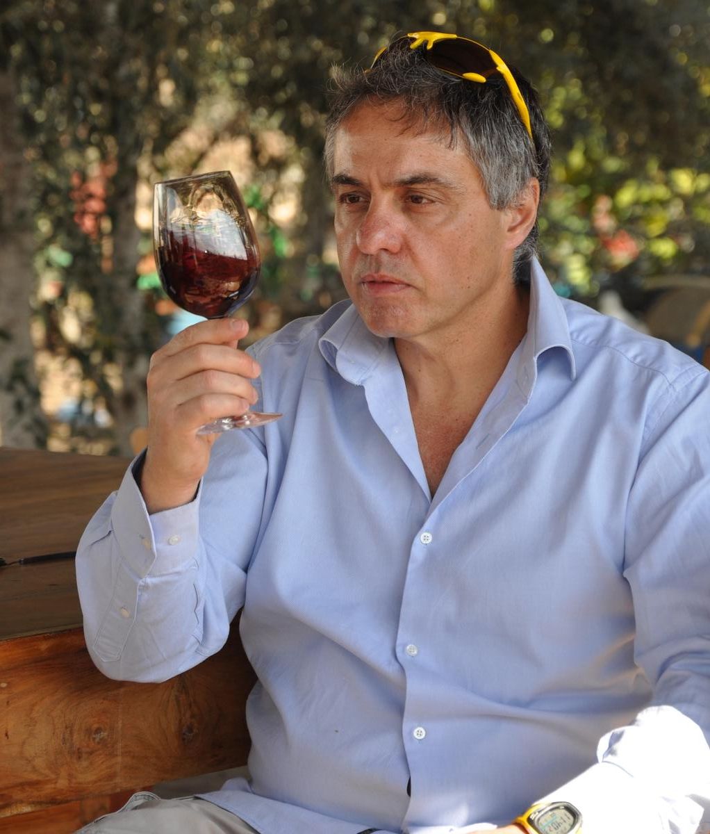 Prof. Oded Shoseyov sampling a product of his Bravdo winery. Photo: courtesy