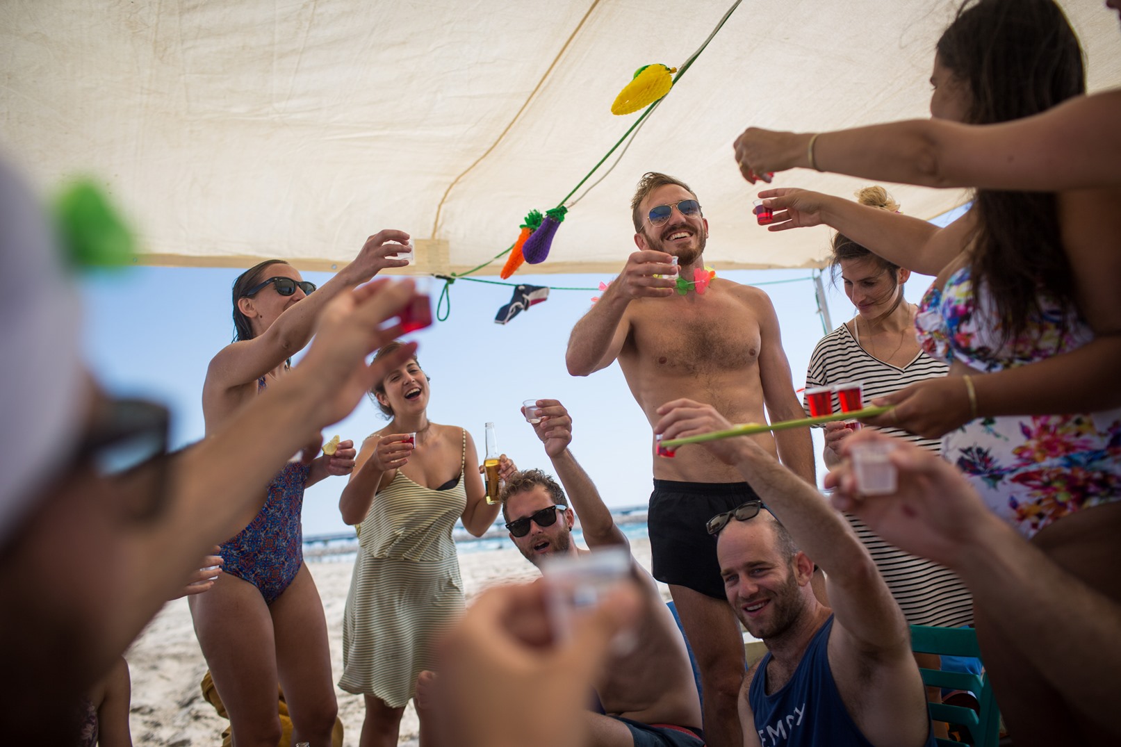 Toasting a summer weekend in a beach shack near Hadera. Photo by Hadas Parush/FLASH90
