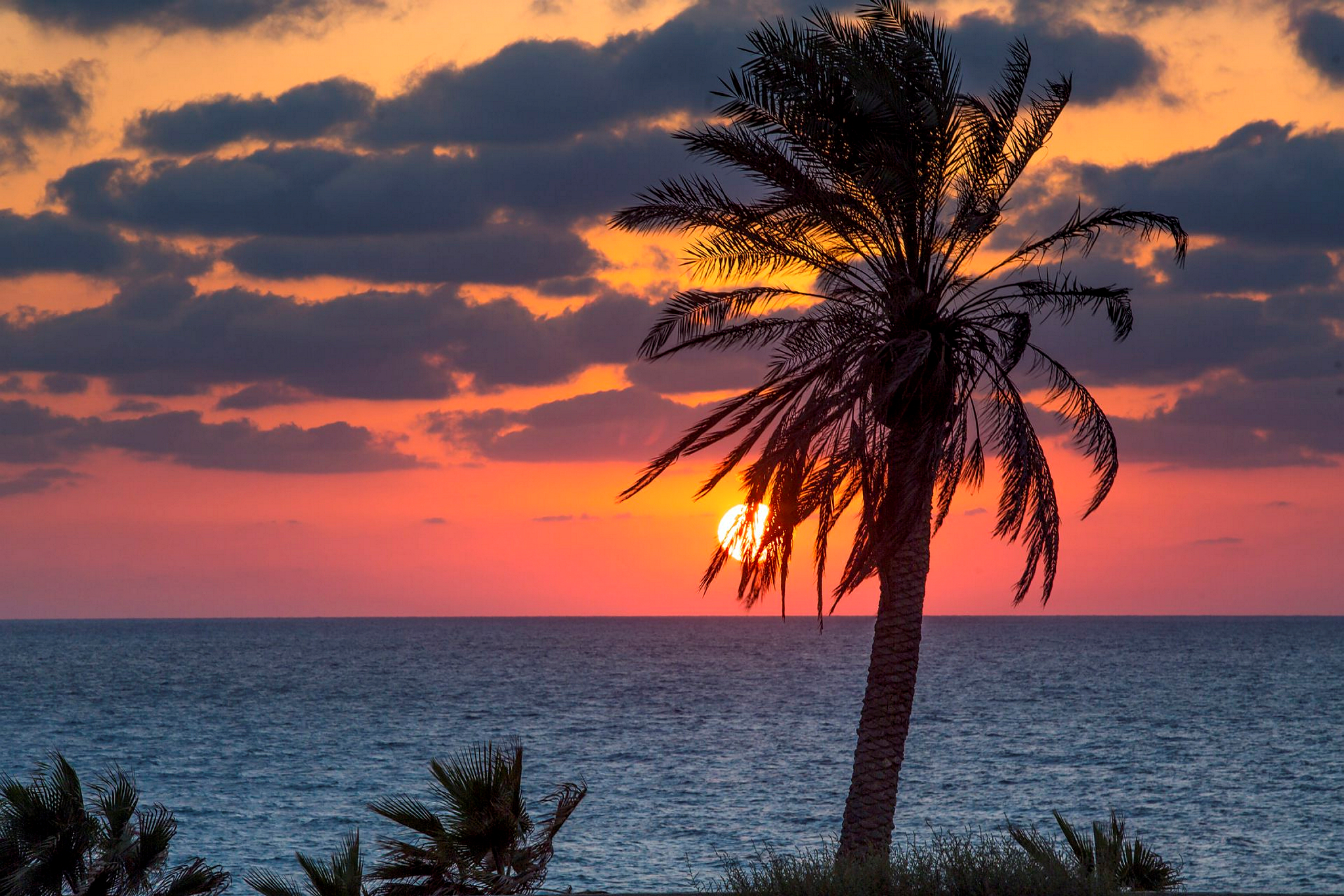 The sun sets over the sea in Ashkelon. Photo by Edi Israel/Flash90