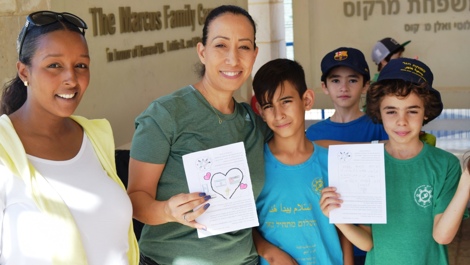 Hagar teachers Elana Melissa, left, and Adi Ben Hamu with students at Ben-Gurion University on the International Day of Tolerance. Photo: courtesy