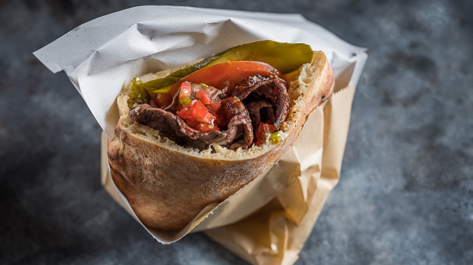 A “minute steak” pita sandwich served in pita at Miznon in Chelsea Market, Manhattan. Photo: courtesy