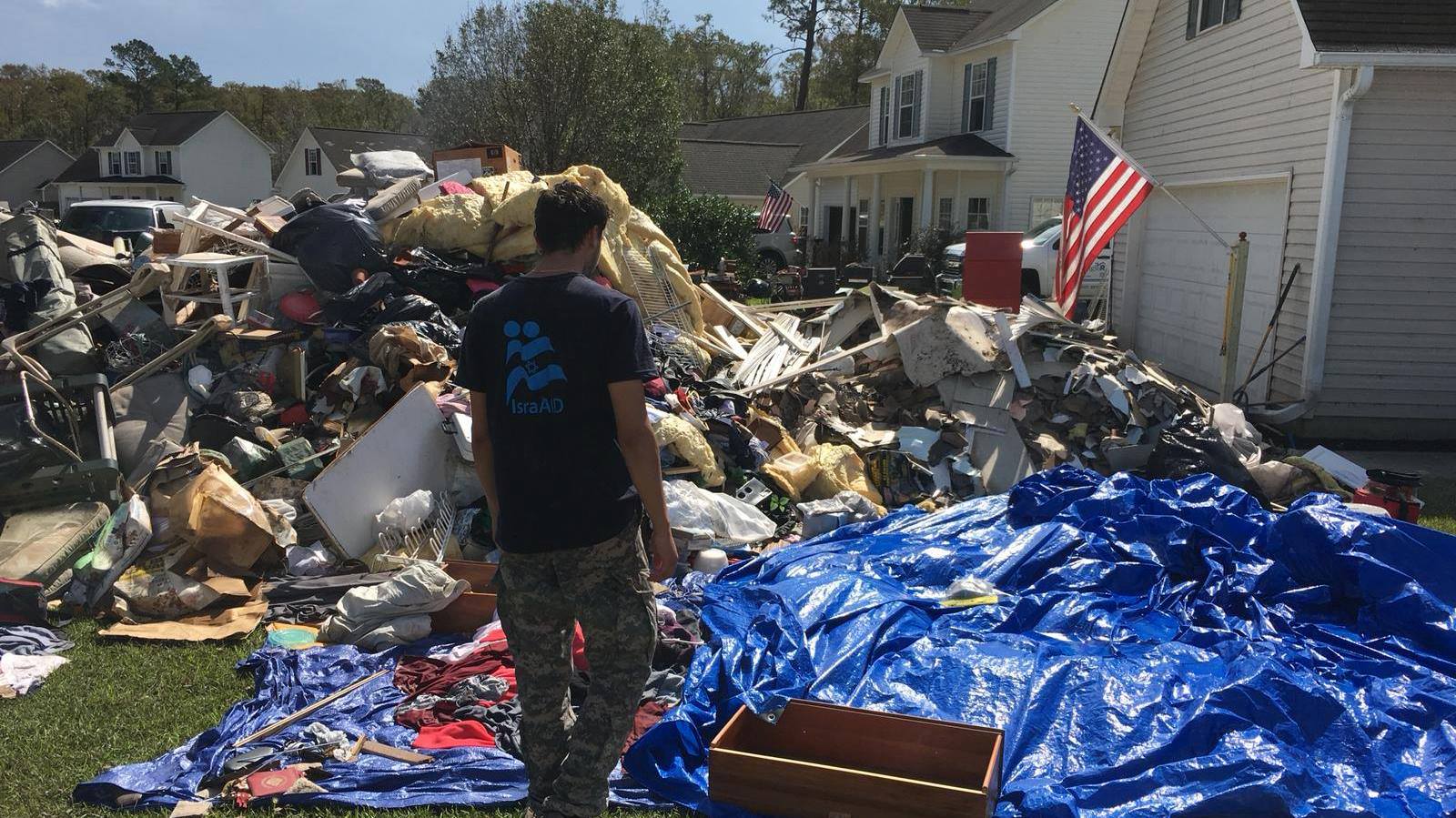 An IsraAID worker confronting massive damage in Wilmington, North Carolina on September 30, 2018. Photo via Facebook