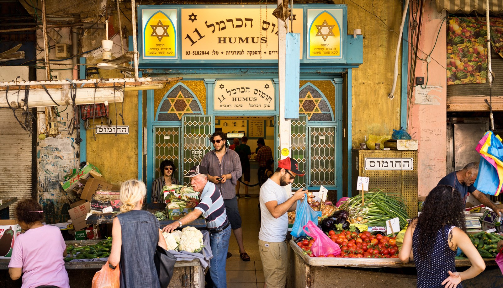 Shopping in Tel Aviv’s Carmel Market. Photo by Ido Biran