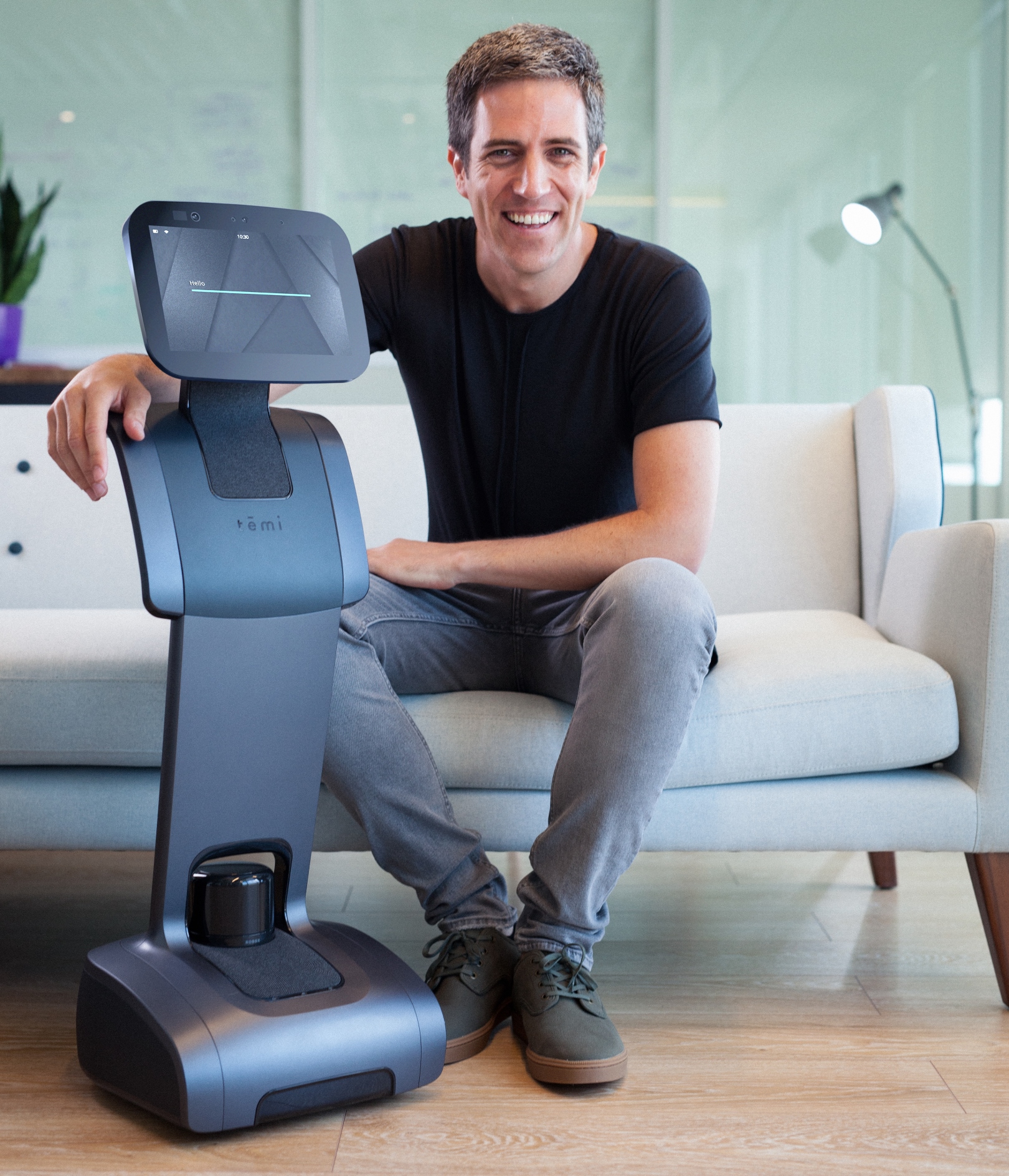 Temi Israel CEO Yossi Wolf with one of the company’s personal robots. Photo: courtesy