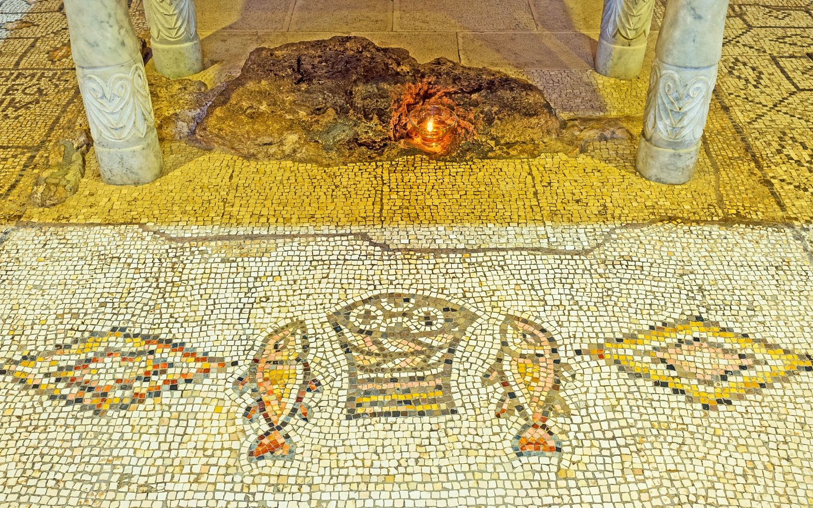Check out ancient mosaics at the Church of the Multiplication of Loaves and Fishes. Photo by eFesenko via shutterstock.com