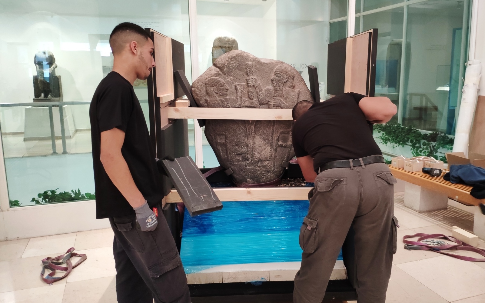 The Bible Lands staff packing ancient items to be loaned to the Louvre. Photo: courtesy