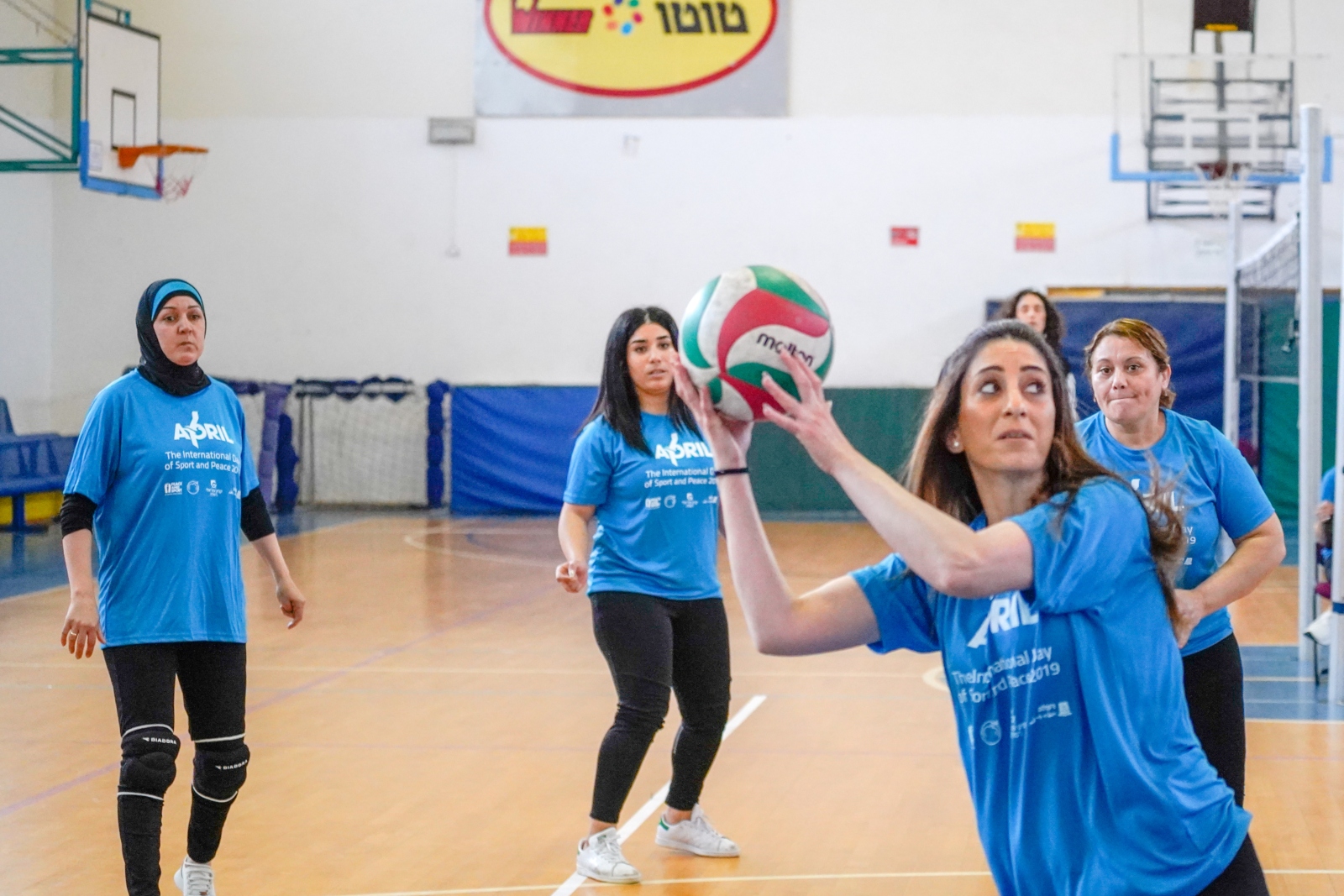 Jewish and Arab women participating in International Day of Sport and Peace, Ramla, Israel. Photo by Jordan Polevoy