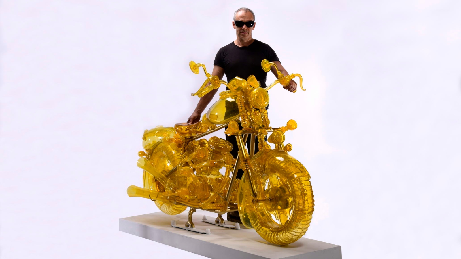 Boris Shpeizman with his glass motorcycle. Photo: courtesy