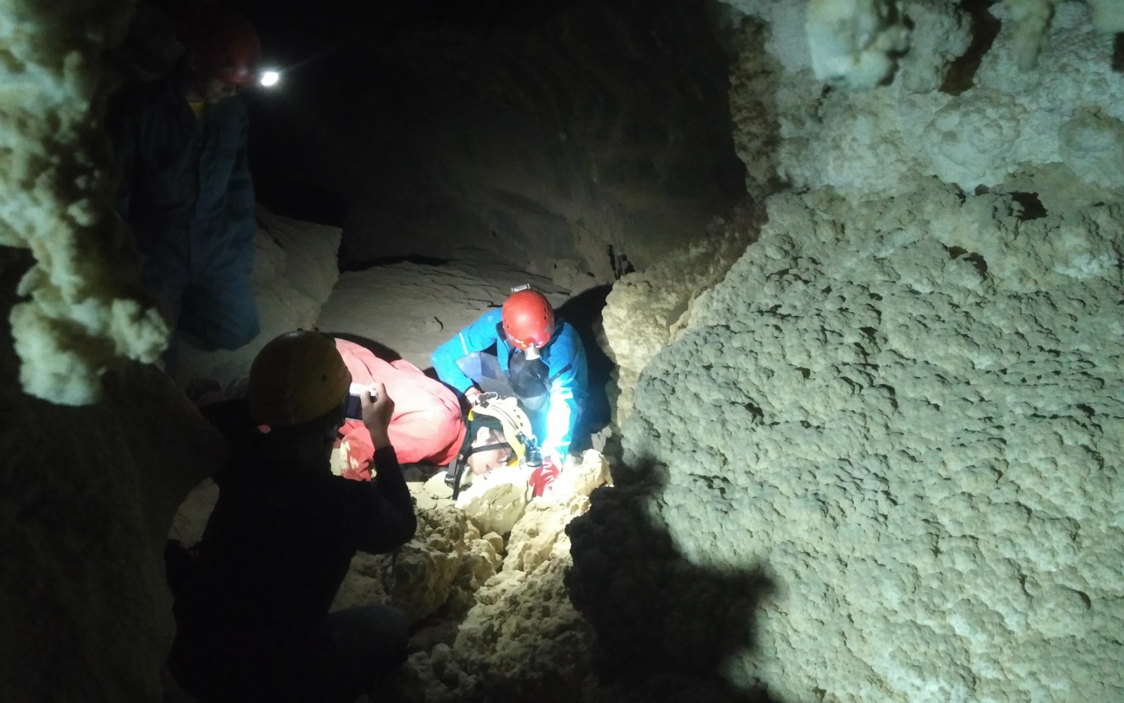 Shining a light inside Malham salt cave, Mount Sedom. Photo by Yoav Negev