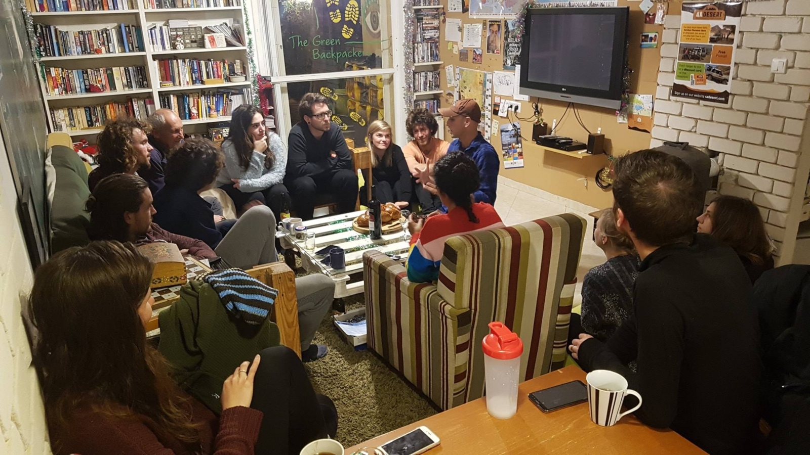 An informal Shabbat dinner at Green Backpackers Hostel, Mitzpeh Ramon. Photo via Facebook