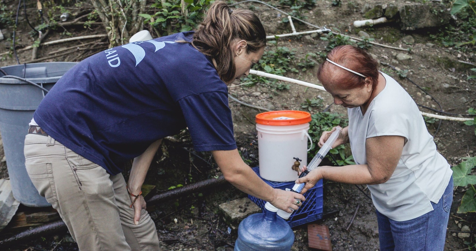 An IsraAID volunteer working with an El Real resident affected by the hurricane. Photo courtesy IsraAID