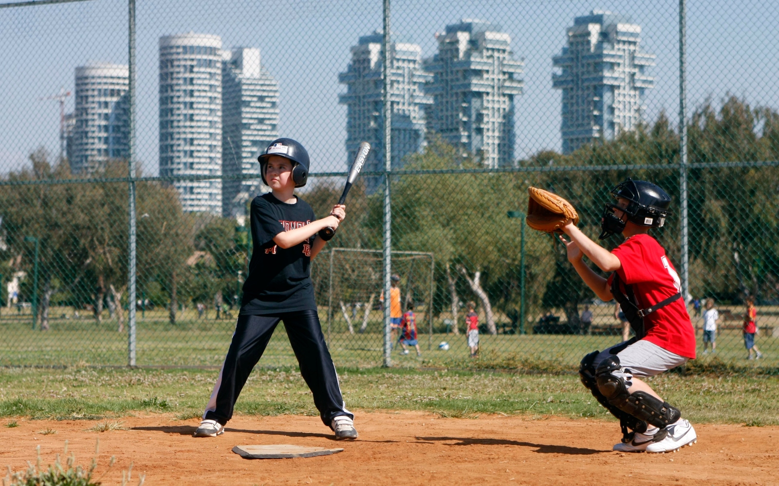 Children playing baseball in Tel Aviv. Photo by Abir Sultan/Flash90
