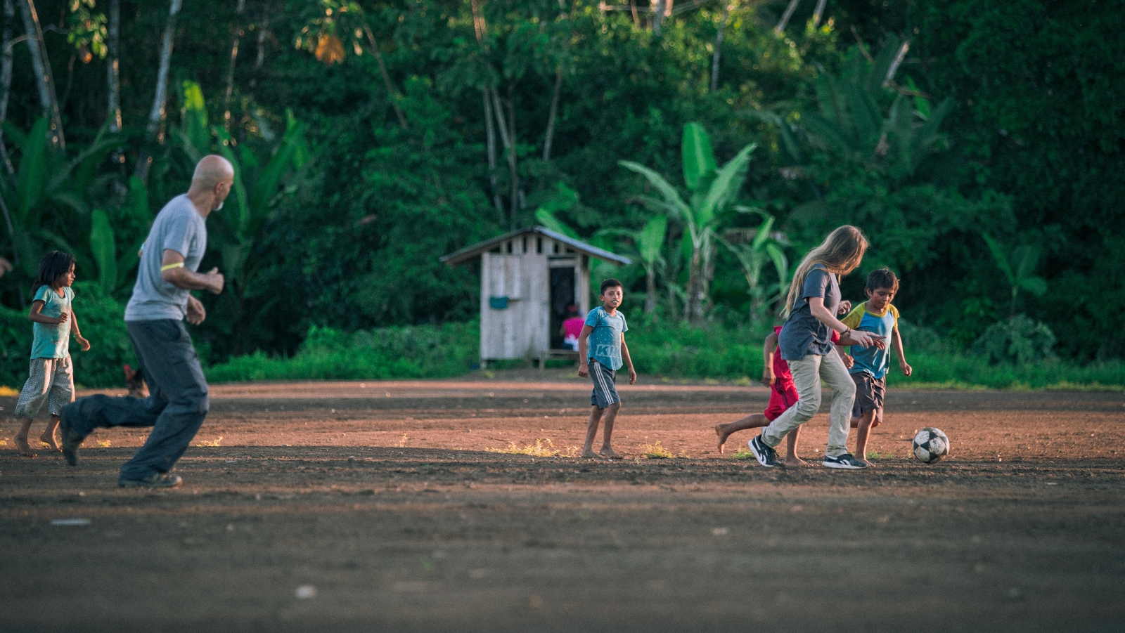 Golan Levi and Miri Racheli of MyHeritage playing soccer with kids in Wayusentsa, Ecuador. Photo courtesy of MyHeritage