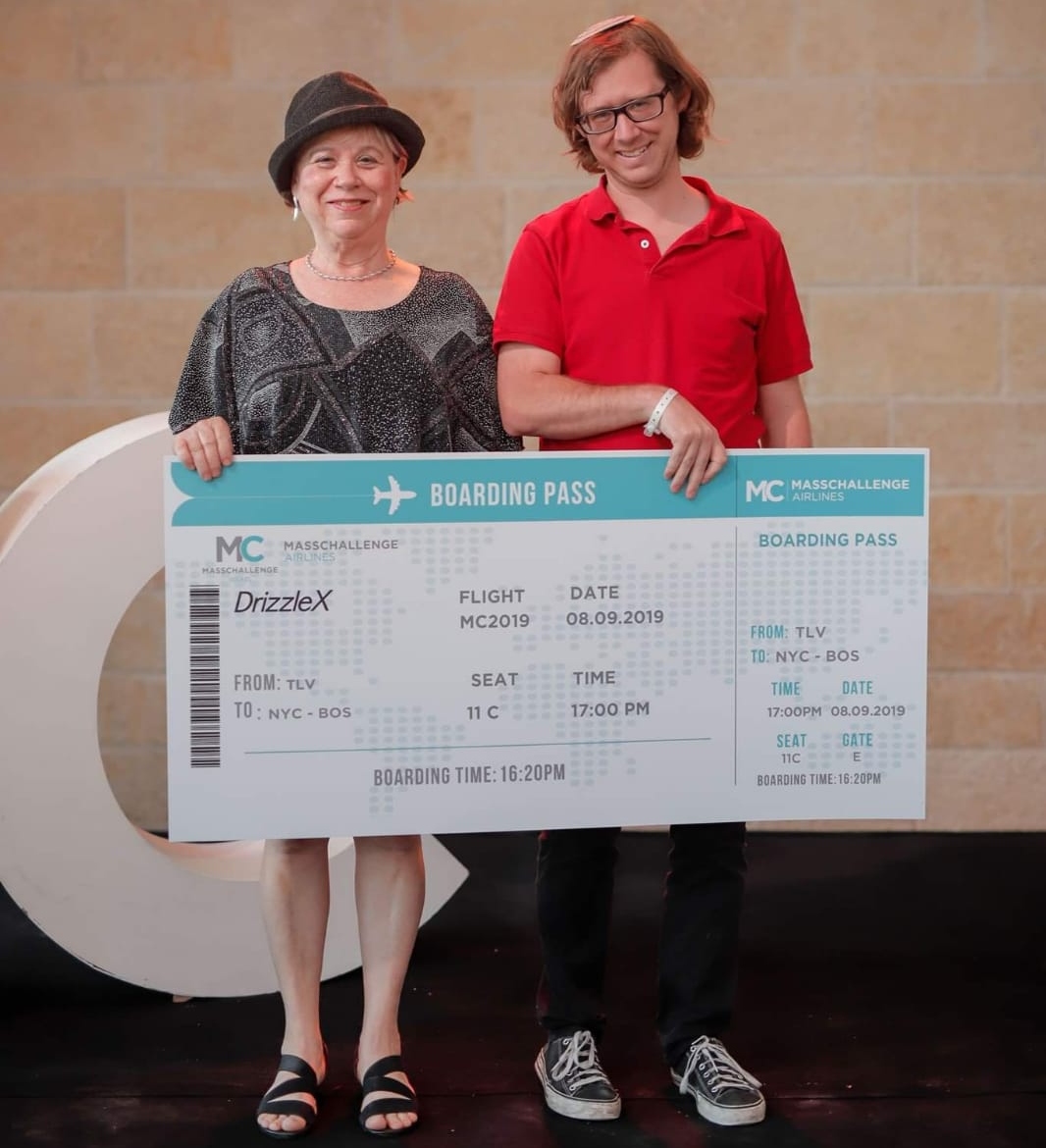 Esther and Ariel Altura with their “ticket” to the MassChallenge U.S. Roadshow. Photo: courtesy