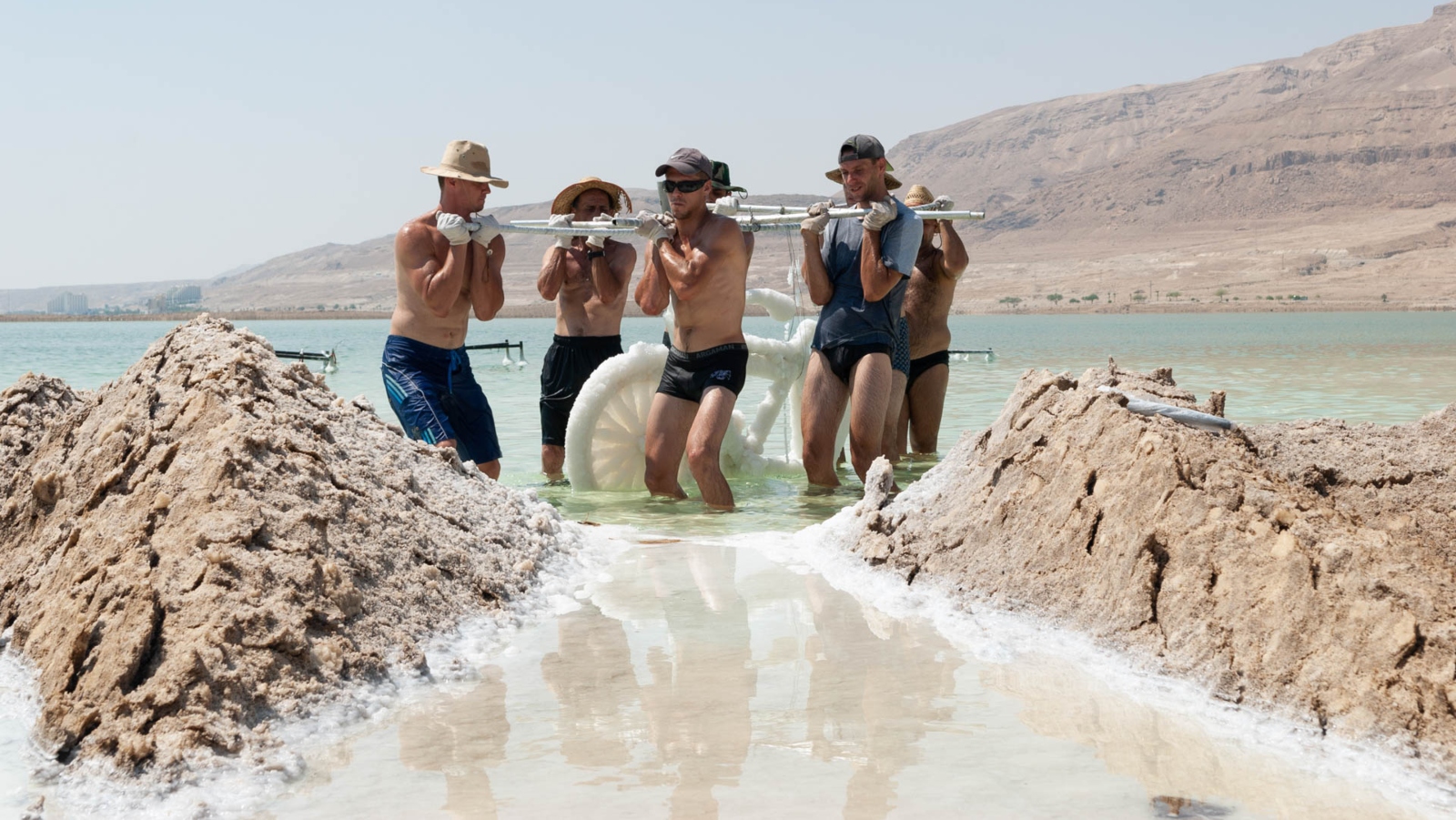 A bicycle coated in salt crystals and weighing more than 150 kg is lifted from the Dead Sea, 2010. Photo by Yotam From, ©Sigalit Landau, 2019