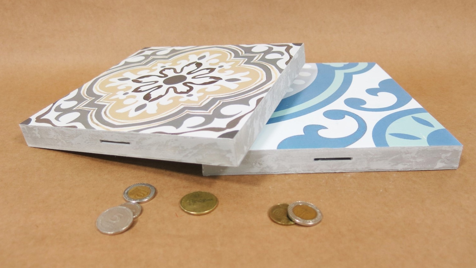 Shaul Cohen’s floor-tile piggybanks. Photo: courtesy