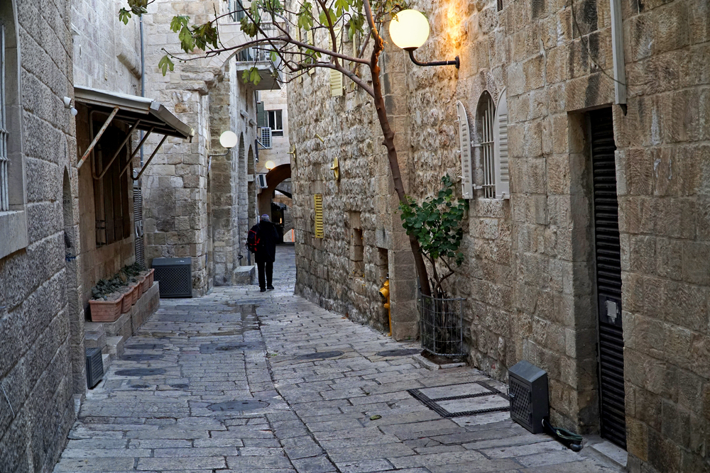 Walking the cobblestones in the Old City of Jerusalem. Photo by Shutterstock