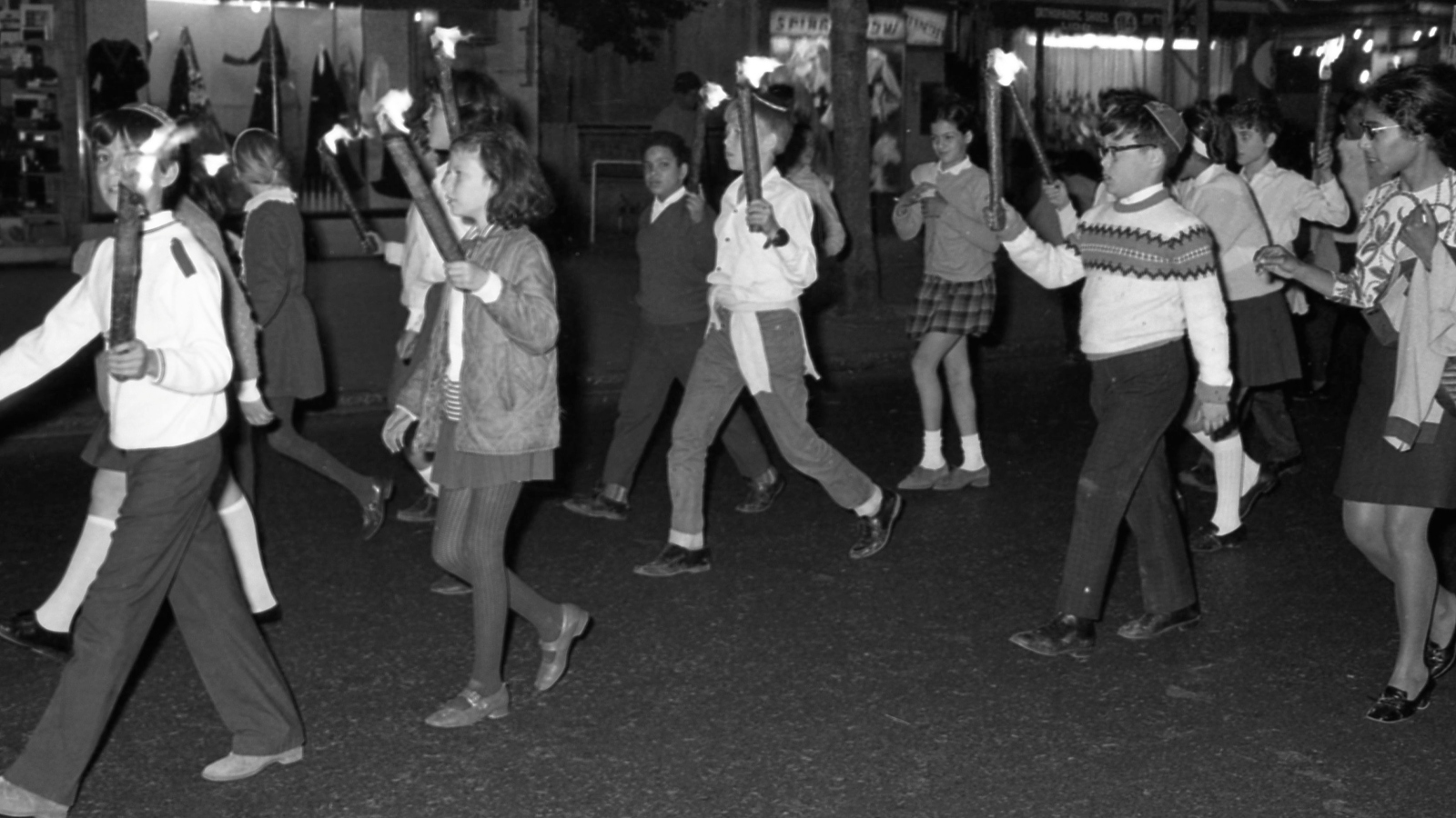 Schoolchildren march down Dizengoff Street in Tel Aviv in a 1970 Hanukkah torchlight parade. Photo courtesy of the Dan Hadani Photo Archive/Pritzker Family National Photography Collection at the National Library of Israel