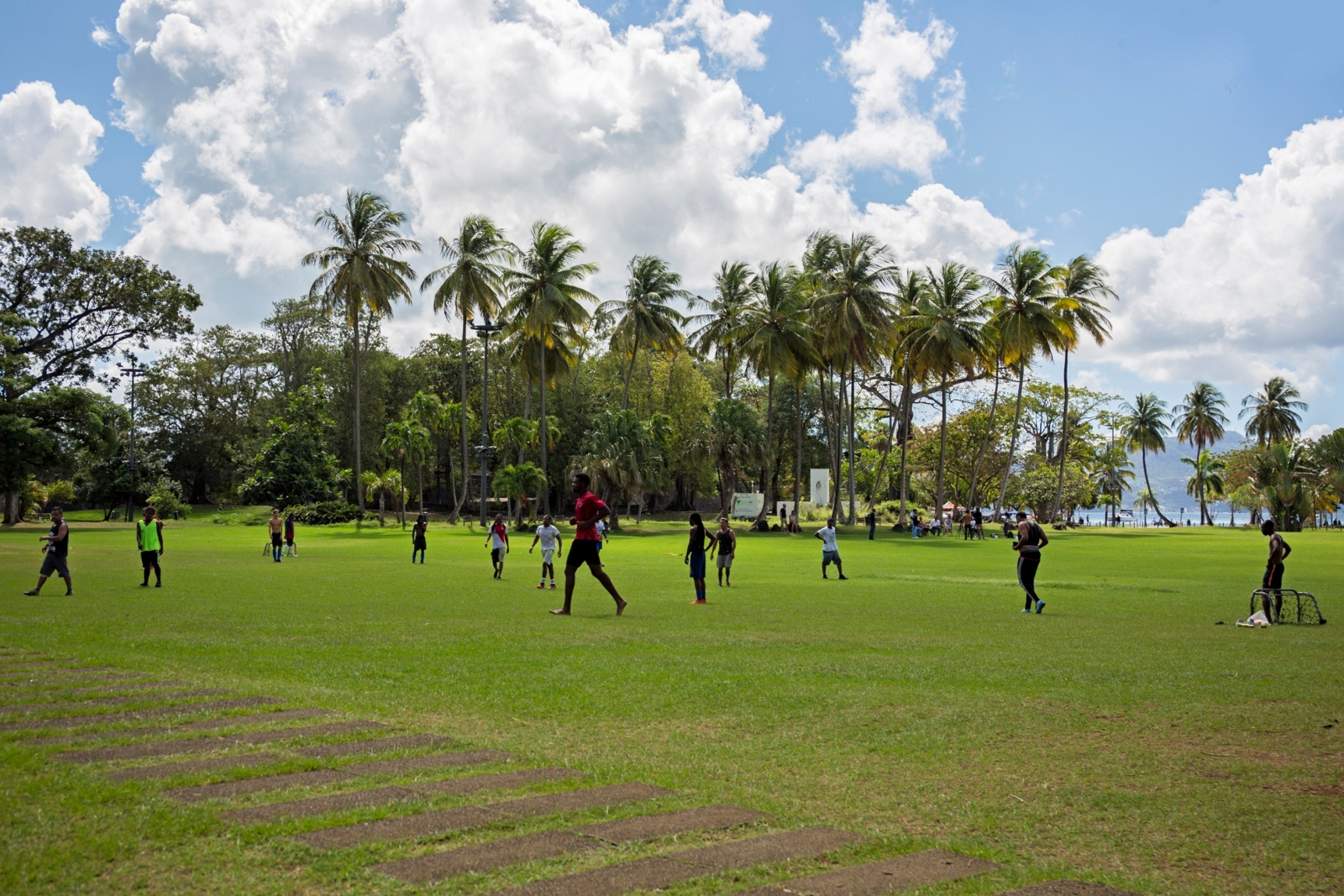 Locals playing sports in a public park near the sea, in the French island territory of Martinique in the Eastern Caribbean. Photo by Ilan Rogers