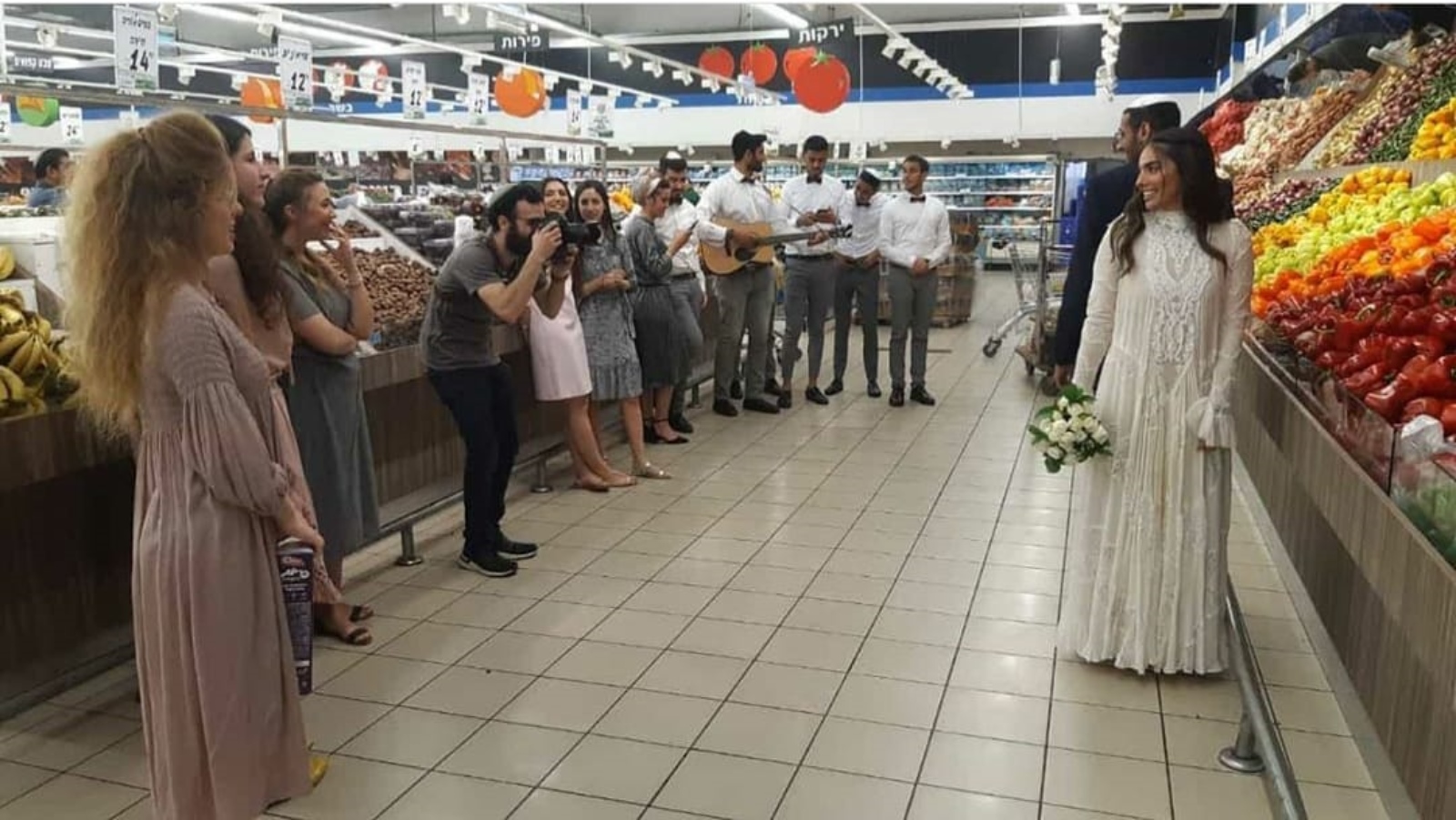 On March 15, 2020, this Israeli couple got married in a supermarket. Photo via Facebook